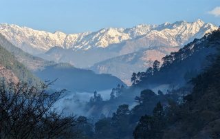 blog blue, cloud shrouded mountains